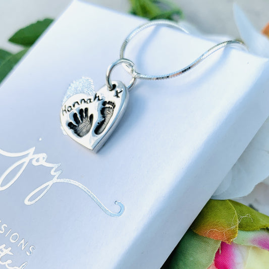 Hand and Footprint Charm Necklace by Joy Impressions with name and kiss on front