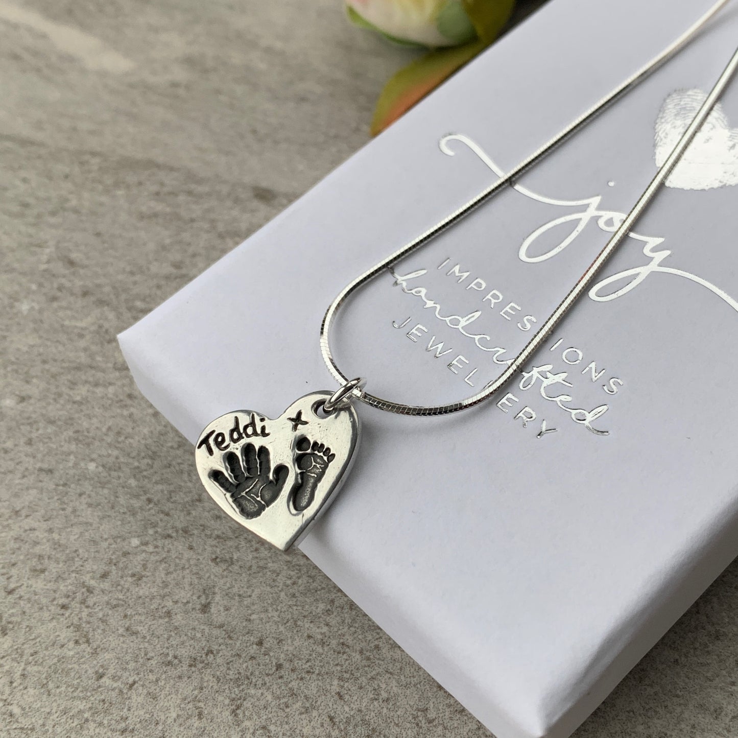 Hand and footprint charm necklace by Joy Impressions