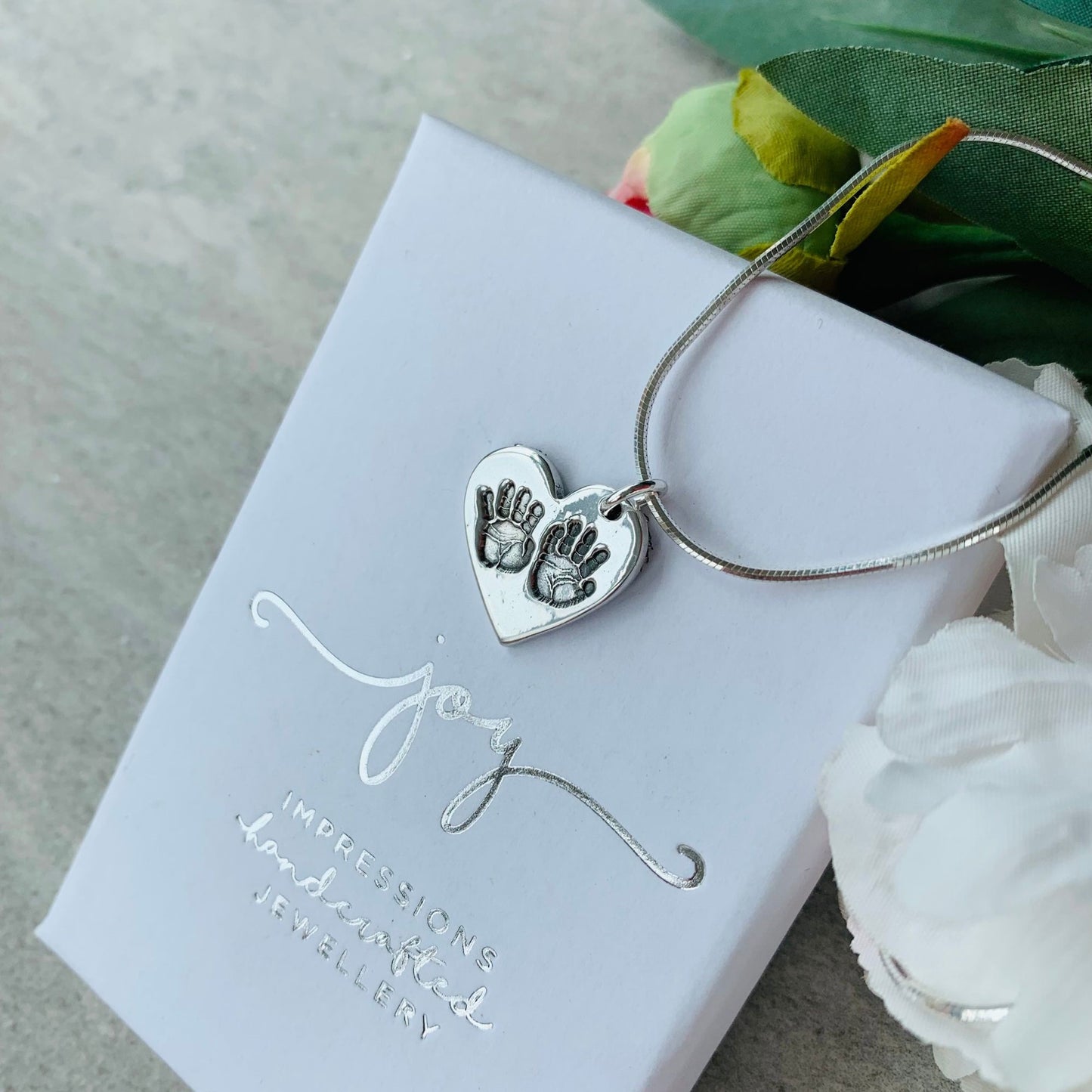 Sibling Handprints on one charm necklace by Joy Impressions